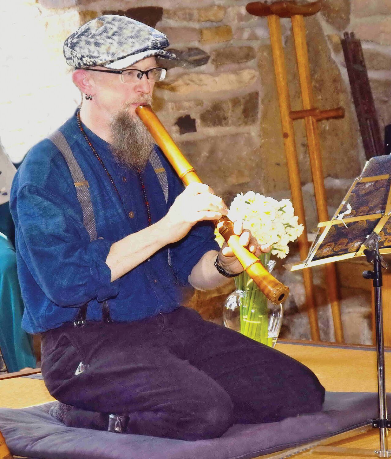 Glenn Swann provides traditional Japanese music on a vintage bamboo flute (shakuhachi).
