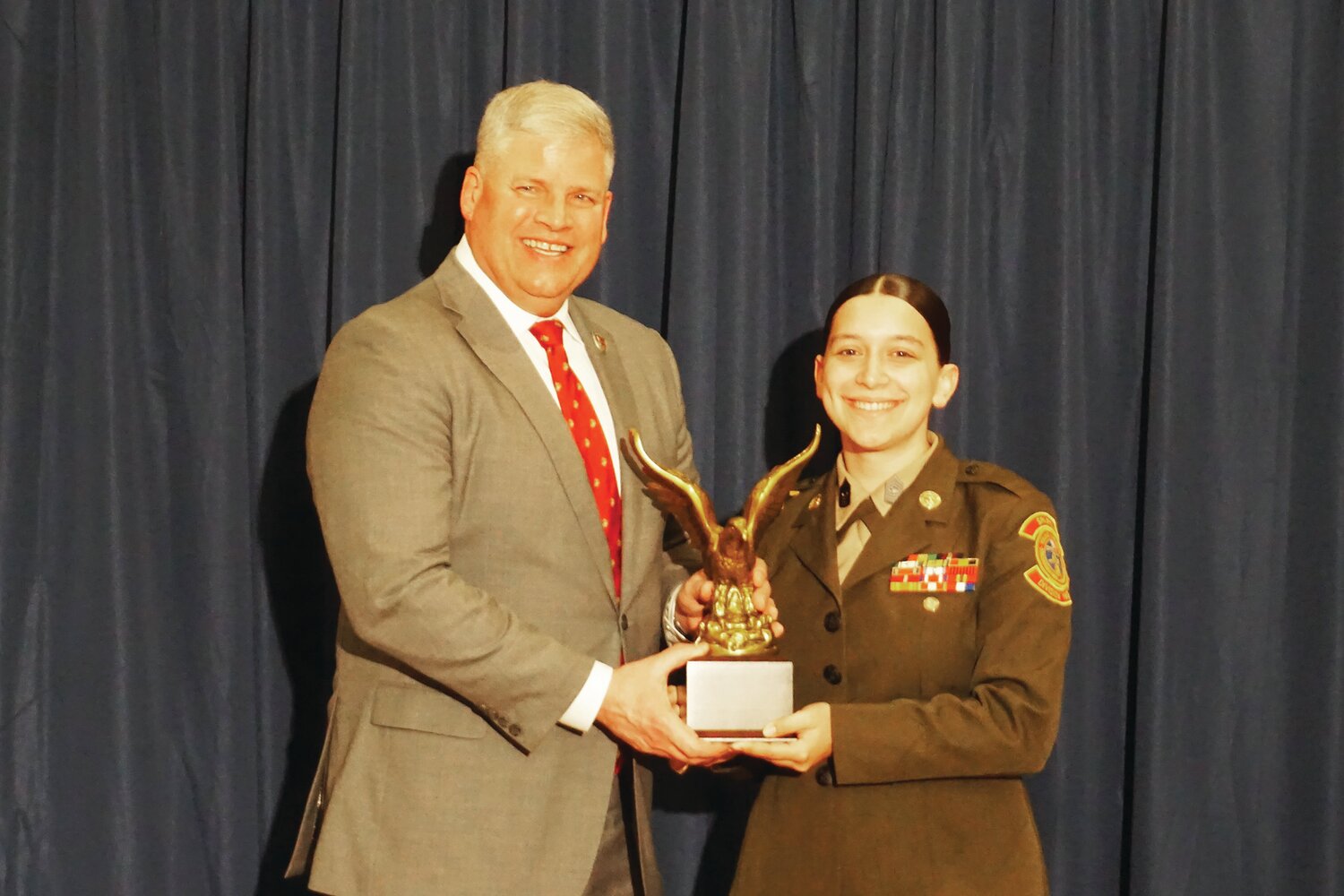 Susan Suber of Pipersville receives the National Young Marine of the Year Award from Col. William P. Davis USMC (retired), national executive director and CEO of the Young Marines.