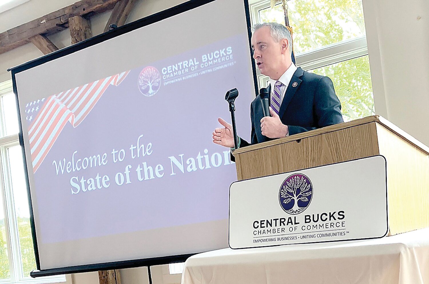 U.S. Rep. Brian Fitzpatrick, R-1, addresses members of the Central Bucks Chamber of Commerce, Friday during a lunchtime “State of the Nation” speech in Buckingham.