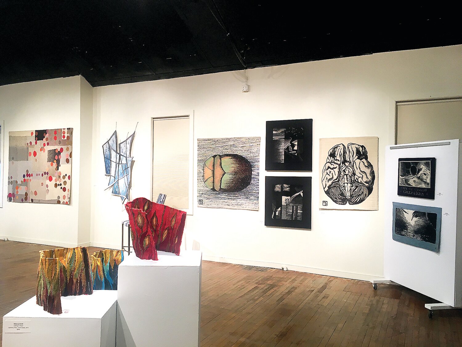 A previous gallery view at New Hope Arts Center from the Weaving Re-Imagined exhibition in 2021.
