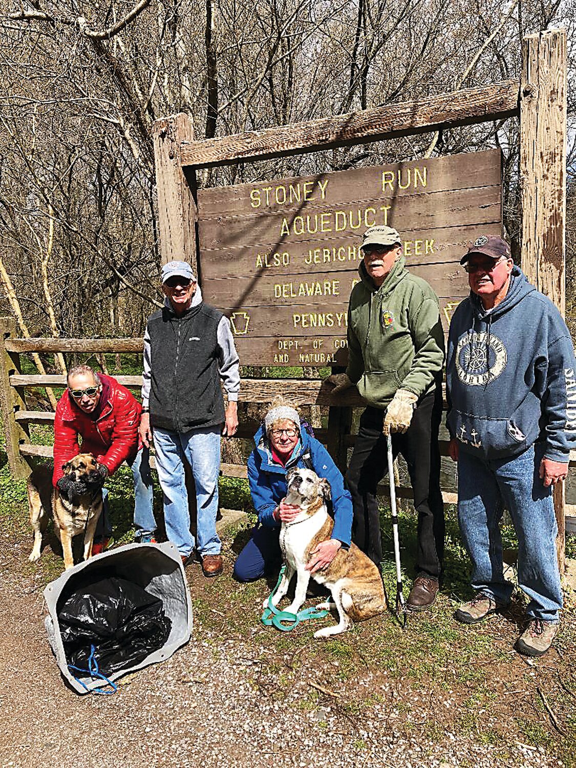 Volunteers stationed near the Stoney Run Aqueduct took part in the April 13 Delaware Canal cleanup event.