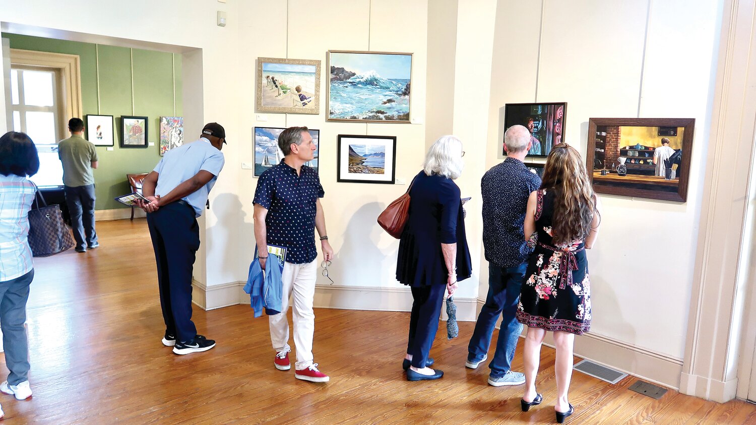 Art lovers peruse the work on display at last year’s Ellarslie Open at the Trenton City Museum.