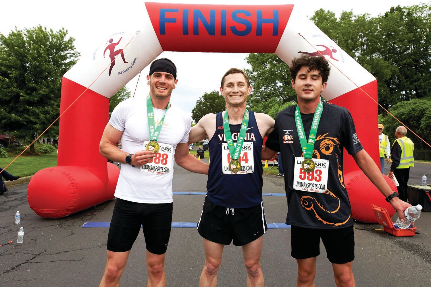 Bill Craven of Glenside, Luke Holman of Arlington, Va., and Chris Baisden of Bensalem, finished third, first and second, respectively, in the Sesame Place Classic 5K.