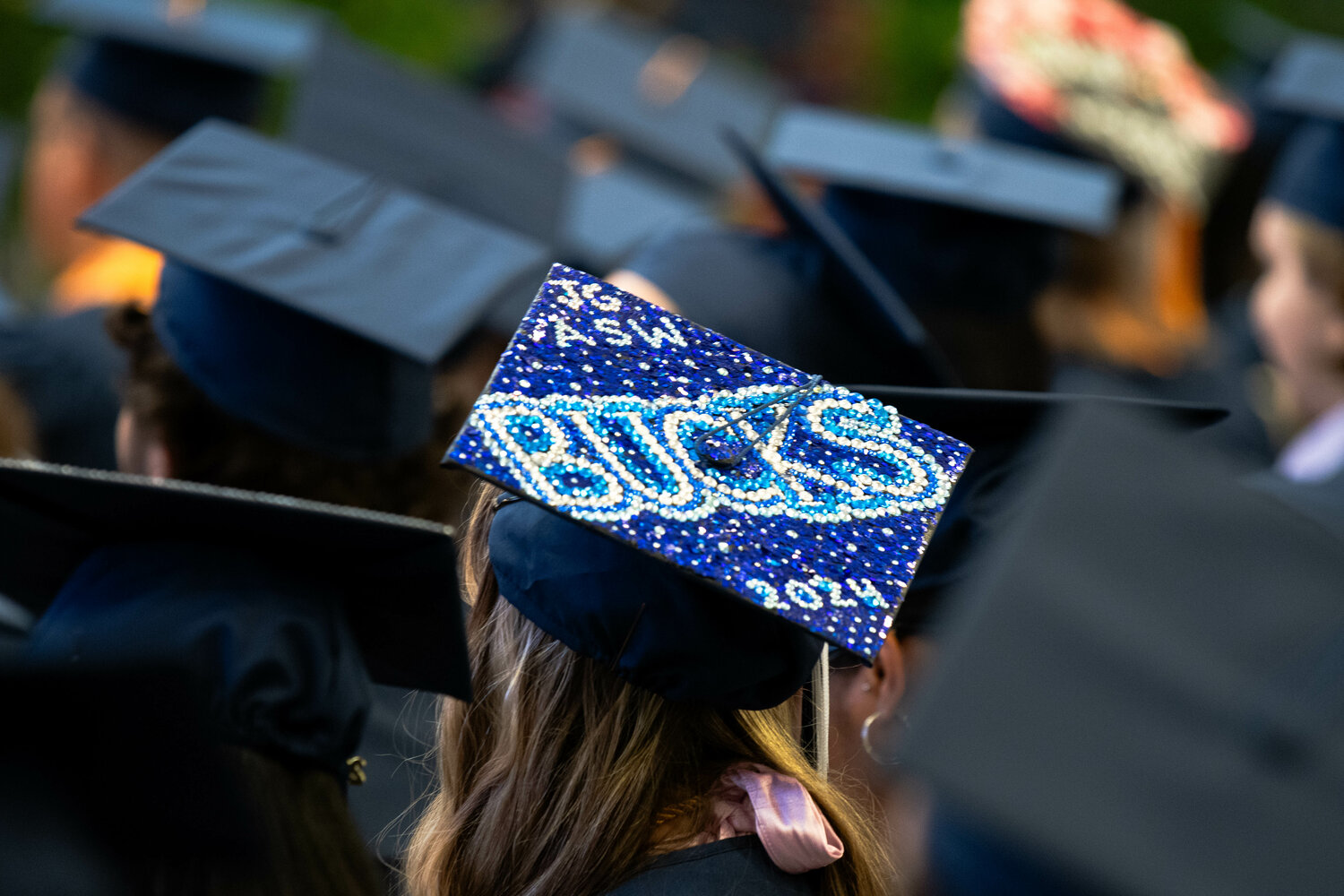 A graduate sports a bedazzled cap at the Bucks County Community College graduation on May 16.