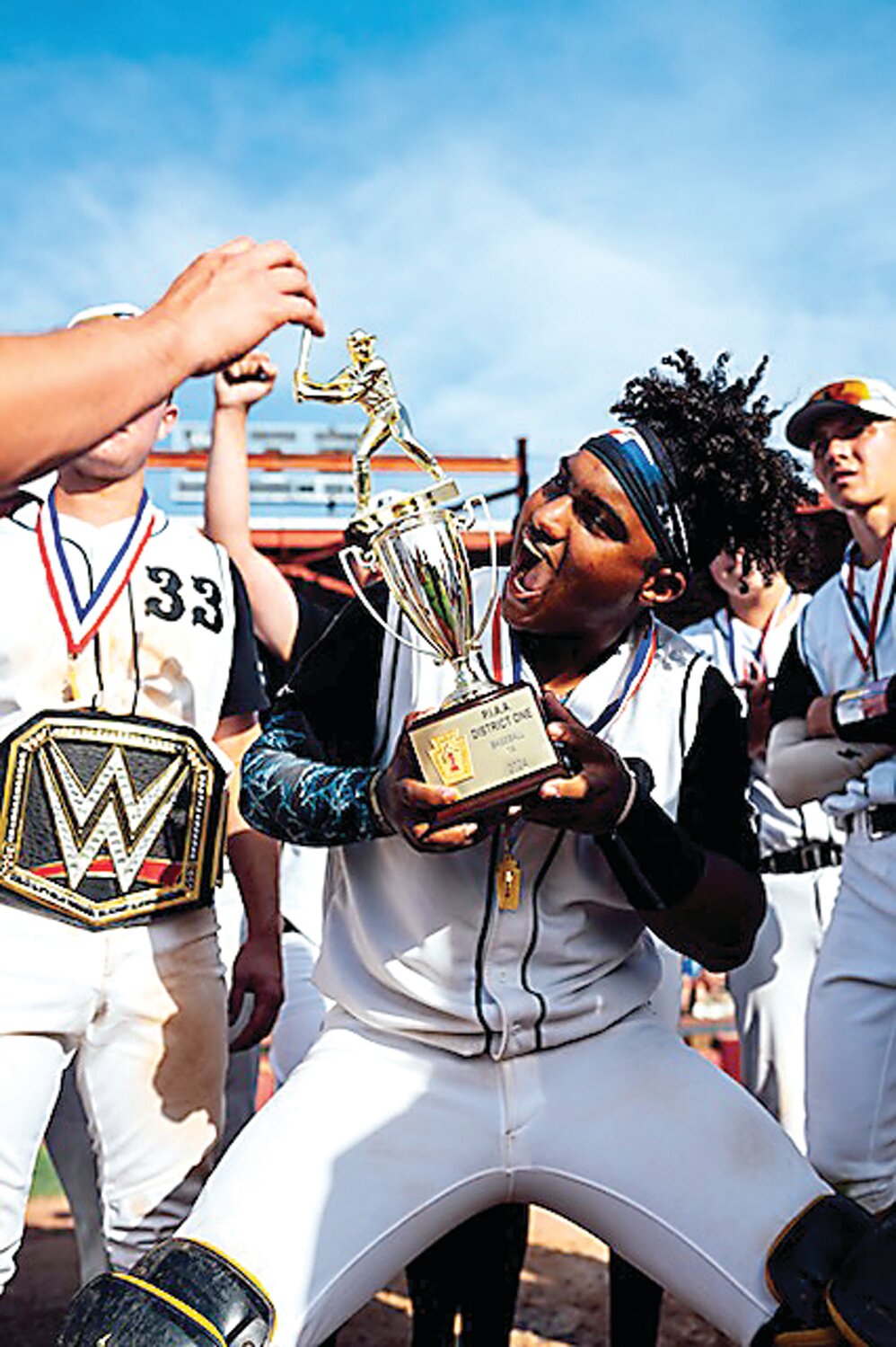 Faith catcher Kendri Beltre celebrates the Lions’ District One Class A title.