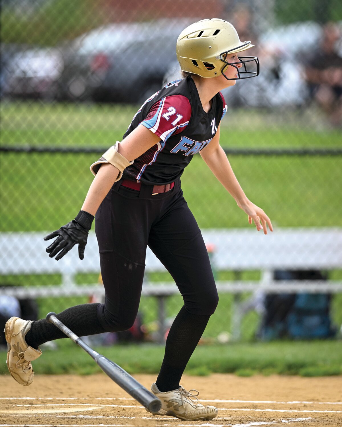 Faith Christian’s Kam Pepkowki watches her first-inning base hit, which put Faith Christian up 1-0.