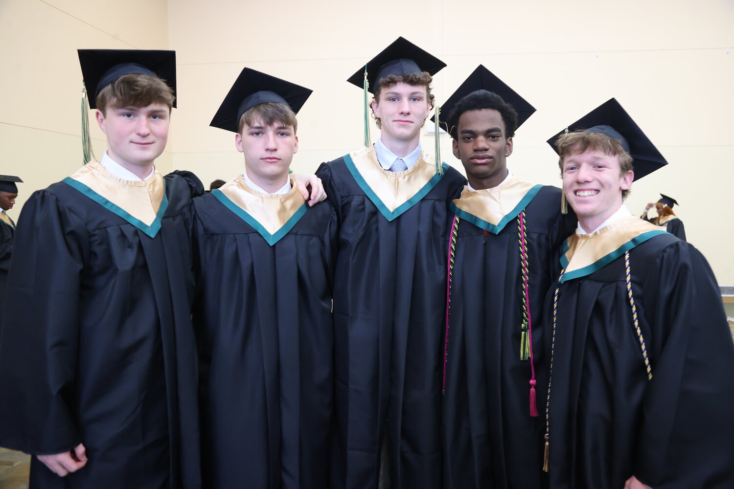 Archbishop Wood seniors pose for a photograph before Monday’s graduation ceremony at Arcadia University.