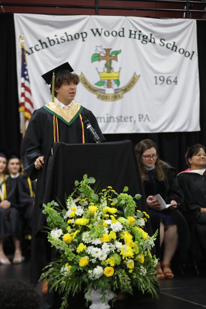 Nicholas Striano, one of two seniors chosen to address the Archbishop Wood High School Class of 2024, speaks during Monday’s commencement ceremony.