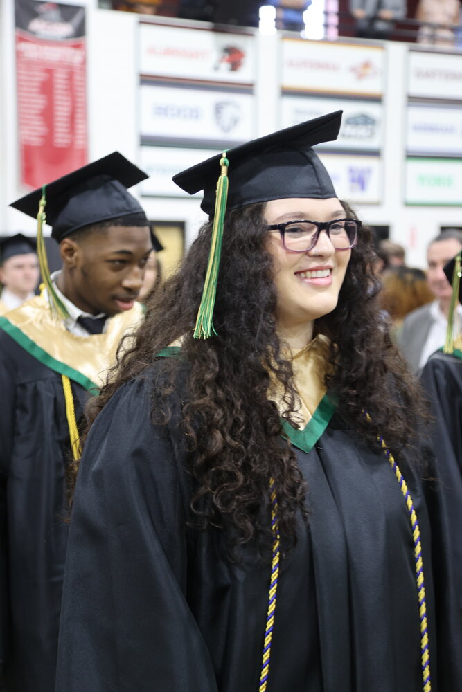 Students process to their seats at the start of this week’s Archbishop Wood High School commencement.