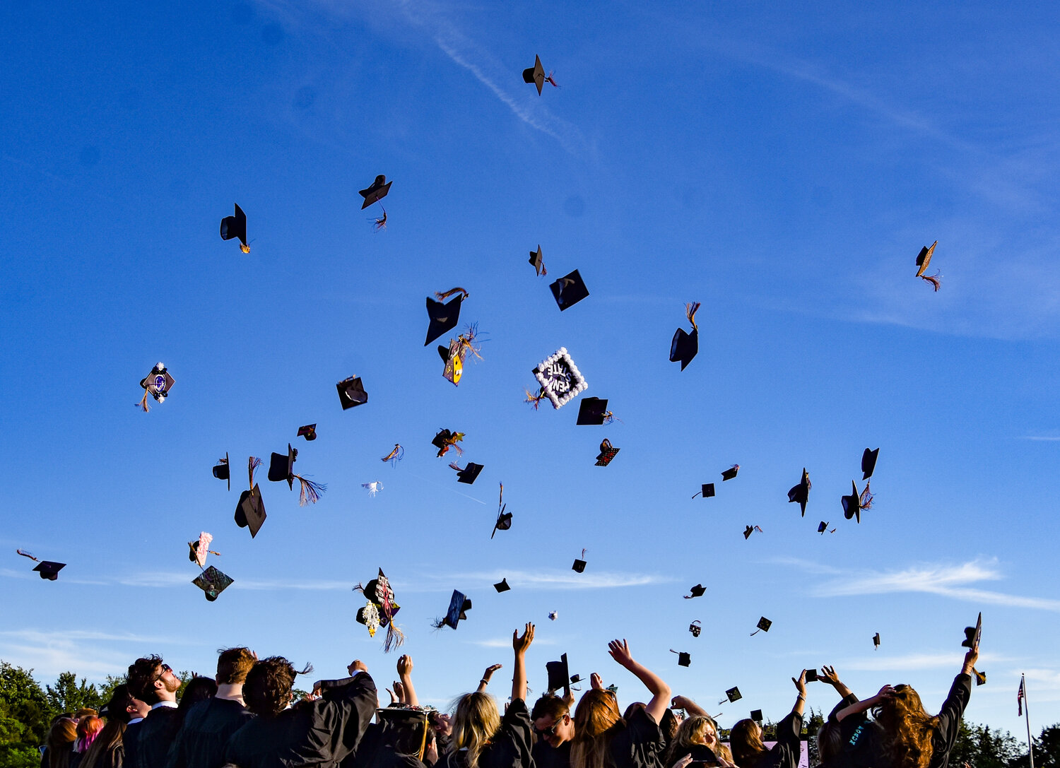 Graduation caps take to the skies over Palisades High School on May 31.