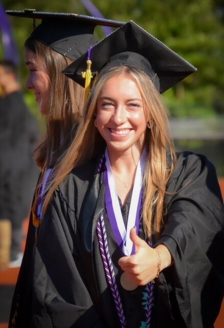 Class President Abigail Mount gives a thumbs up during the May 31 graduation ceremony at Palisades High School.