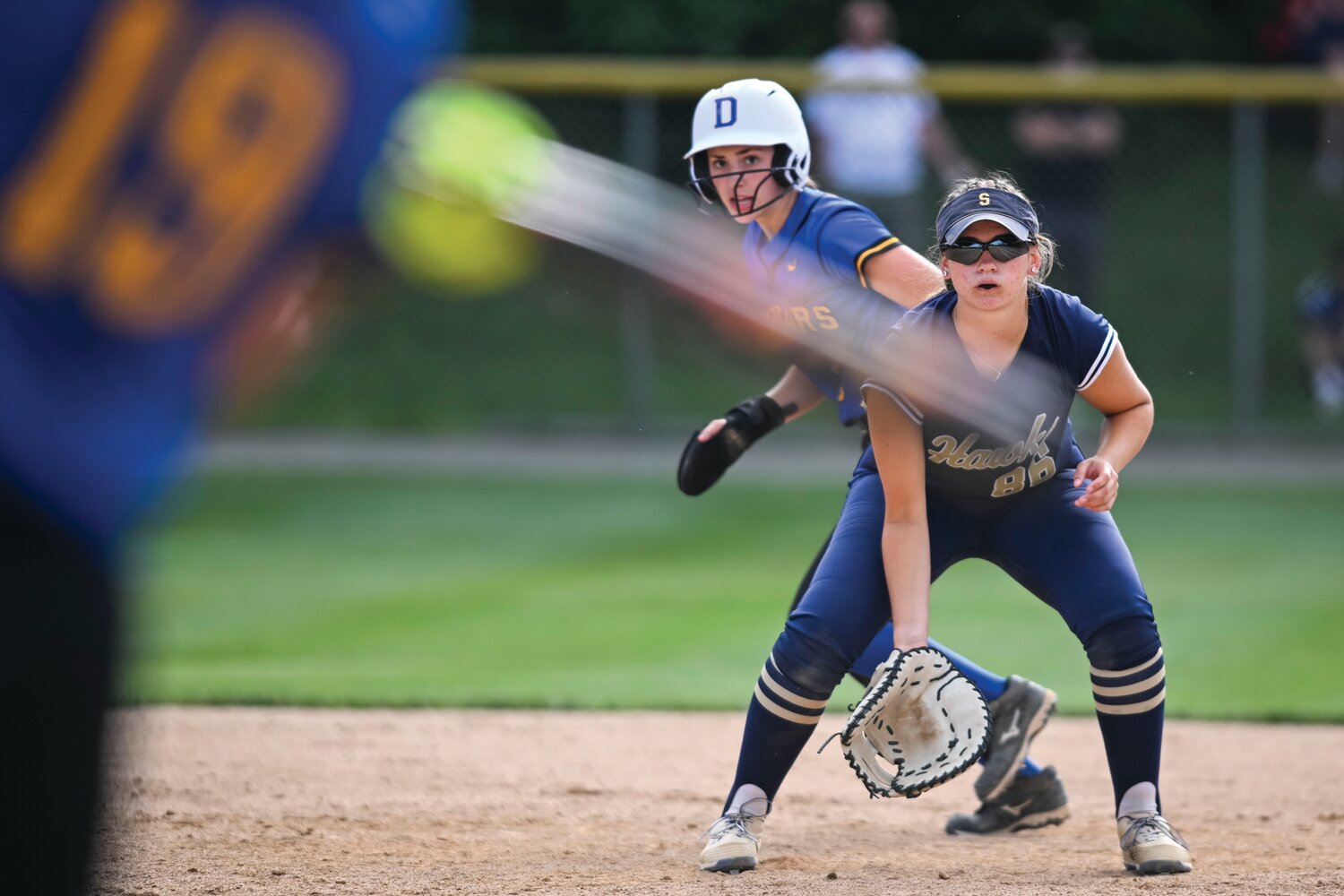 Council Rock South’s Julia Scannapieco eyes the ball hit by Downingtown East’s Rachael Schumann during the top of the fifth inning.