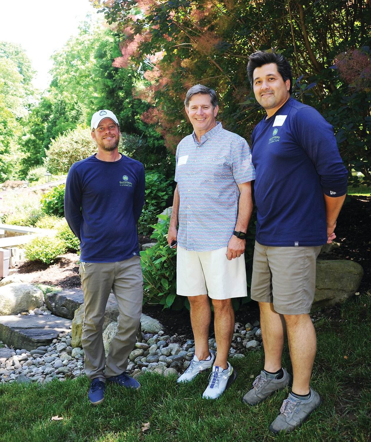Tim Ebersole of Sycamore Landscaping, homeowner Don Barder and Justin Braley, owner of Sycamore landscaping.