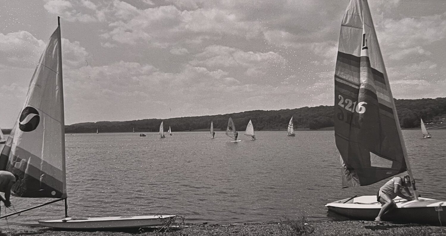 Small sailboats travel across Lake Galena in Bucks County.