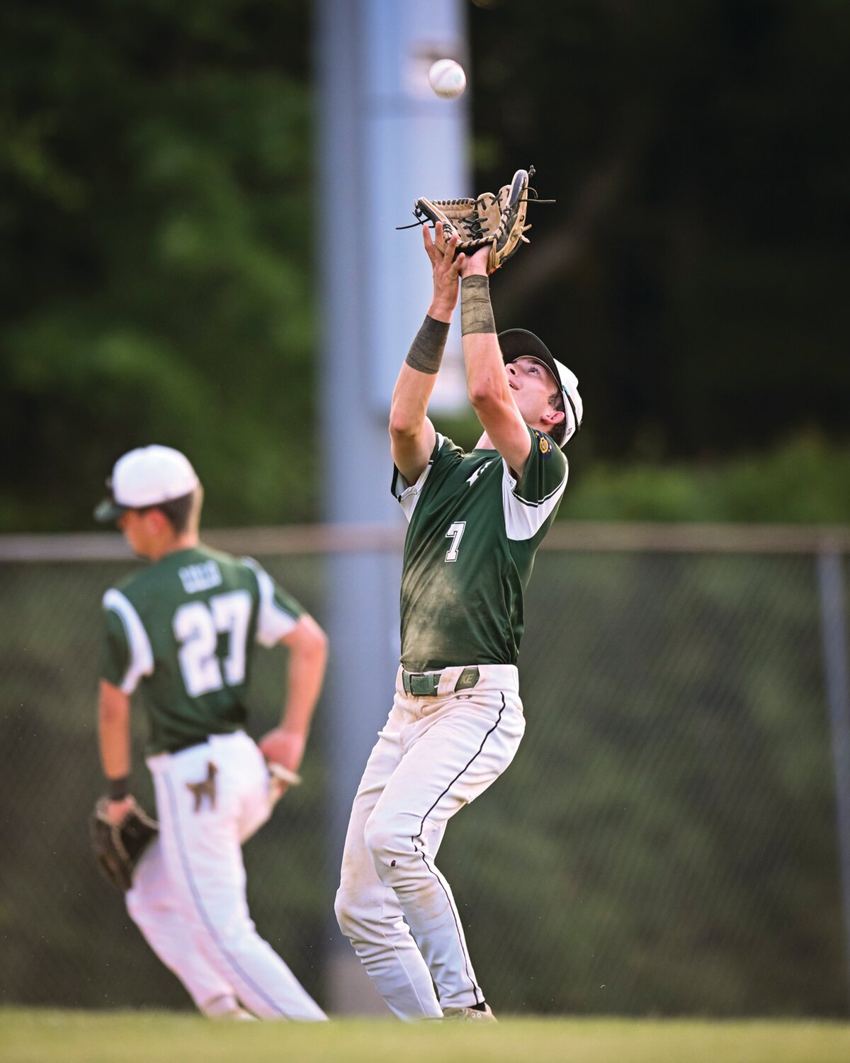 Pennridge’s Will Munley finishes off an infield popup during the third inning.