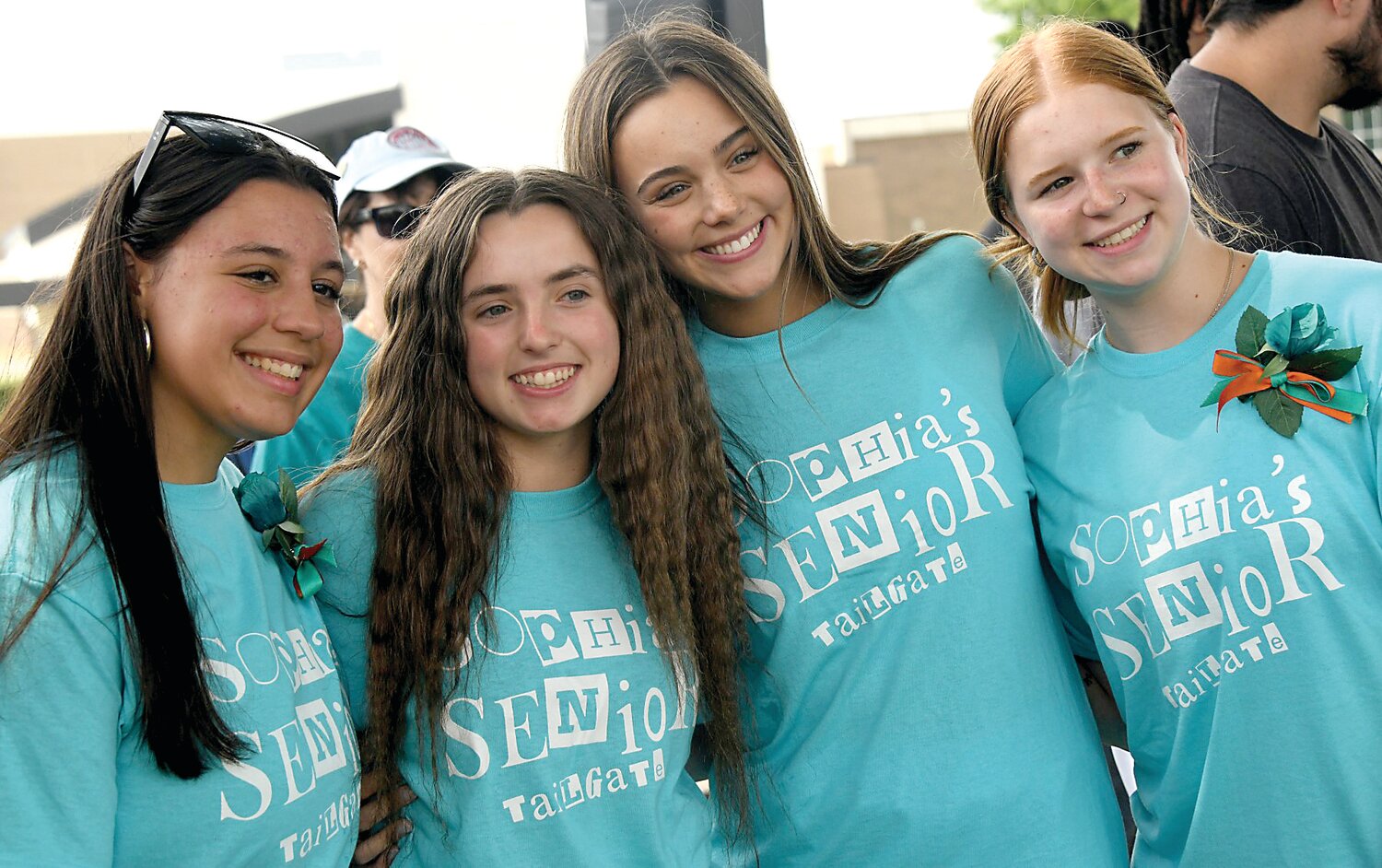 Julianna Pasquarella, Sophia’s sister, third from left, enjoys music and conversation with friends, from left, Sarah Brown, Mollie Ryanowski and Abby Wodotinski.