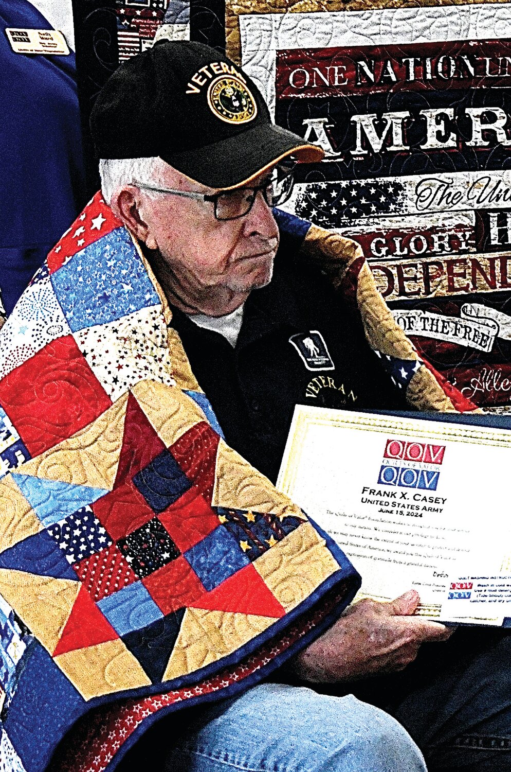 Army veteran Frank X. Casey received a quilt from the Quilts of Valor organization.