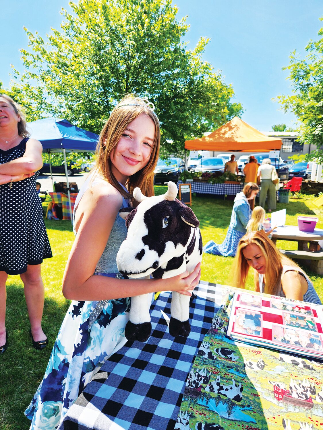 Bucks County Dairy Maid Randi Heintz attended  opening day at this year’s Plumsteadville Grange Farm Market.