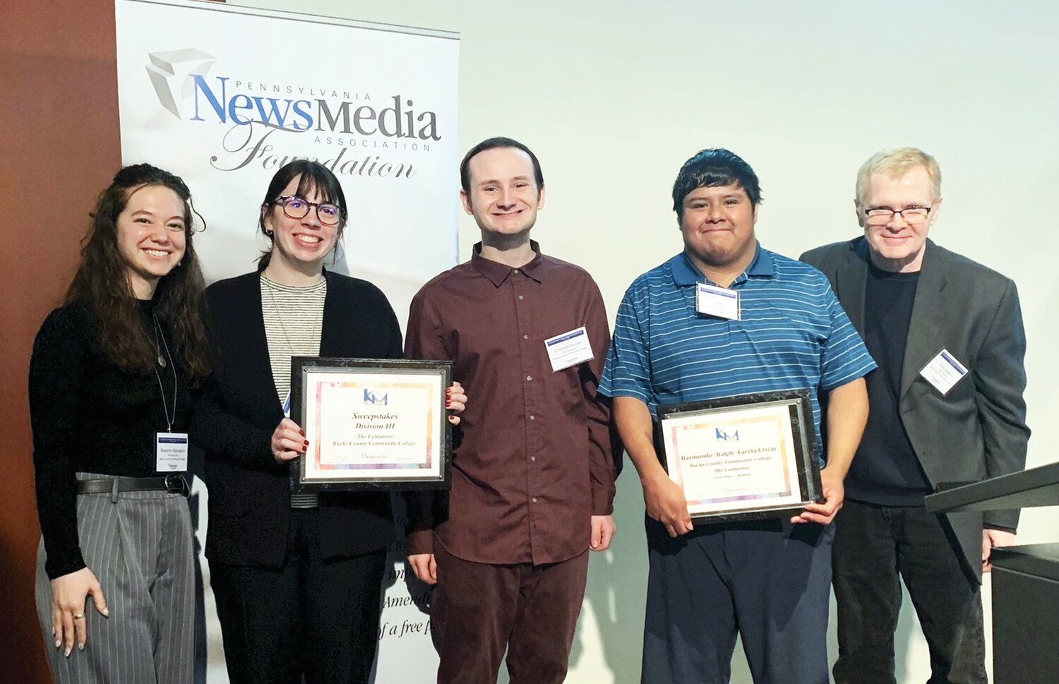 The Centurion staffers, from left, Raeanne Raccagno, Madison Kifolo, Christian Grosso and Raymundo Varela-Urizar, stand with journalism professor and newspaper advisor Tony Rogers at the Student Keystone Media Awards reception in April.