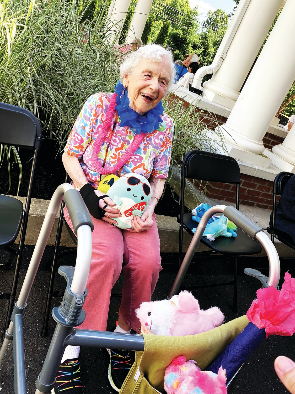 A Bridges at Warwick resident has fun at an intergenerational carnival attended by seniors and fifth graders from Jamison Elementary School.
