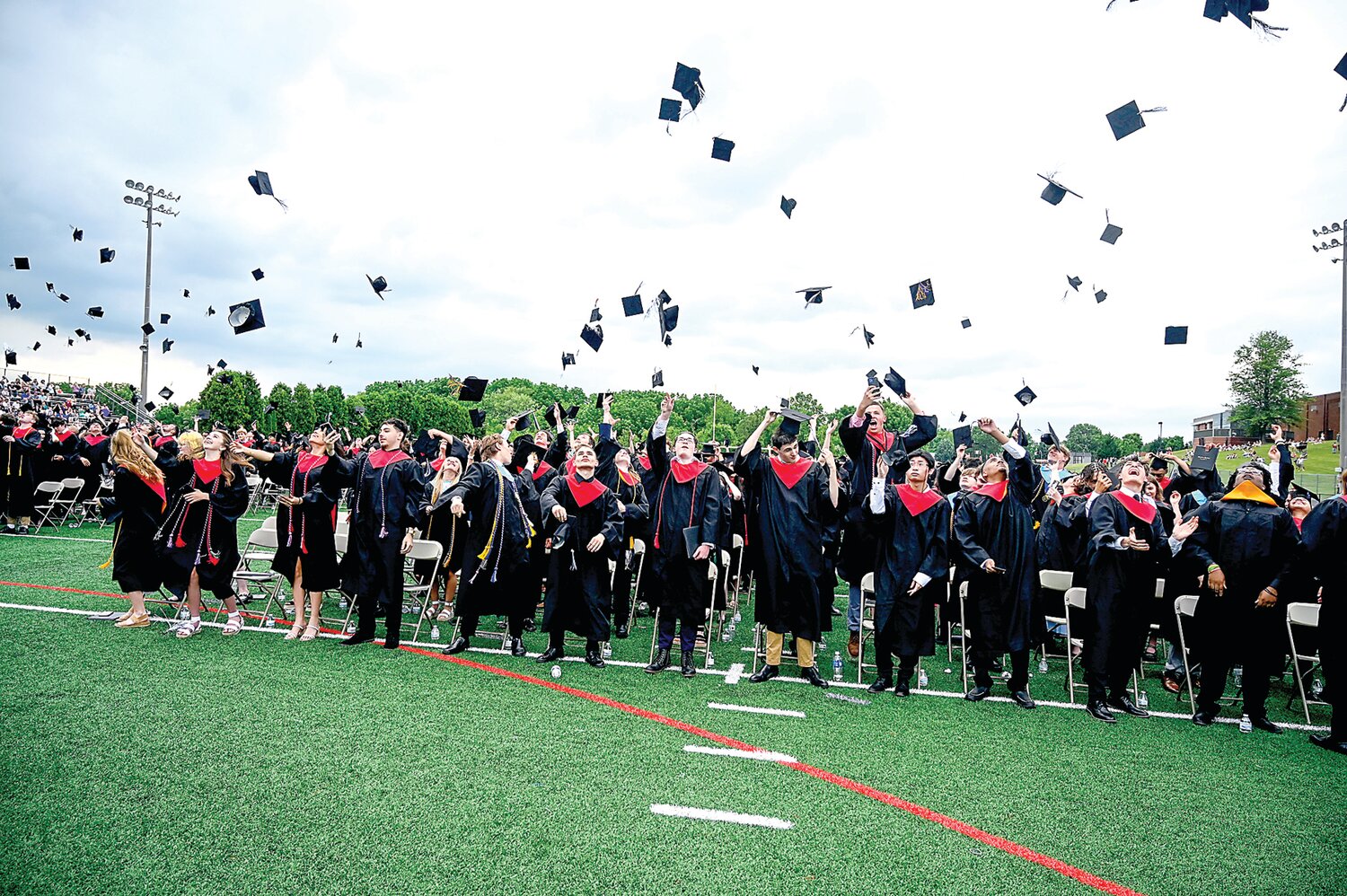 William Tennent’s newest graduates toss their caps in celebration.