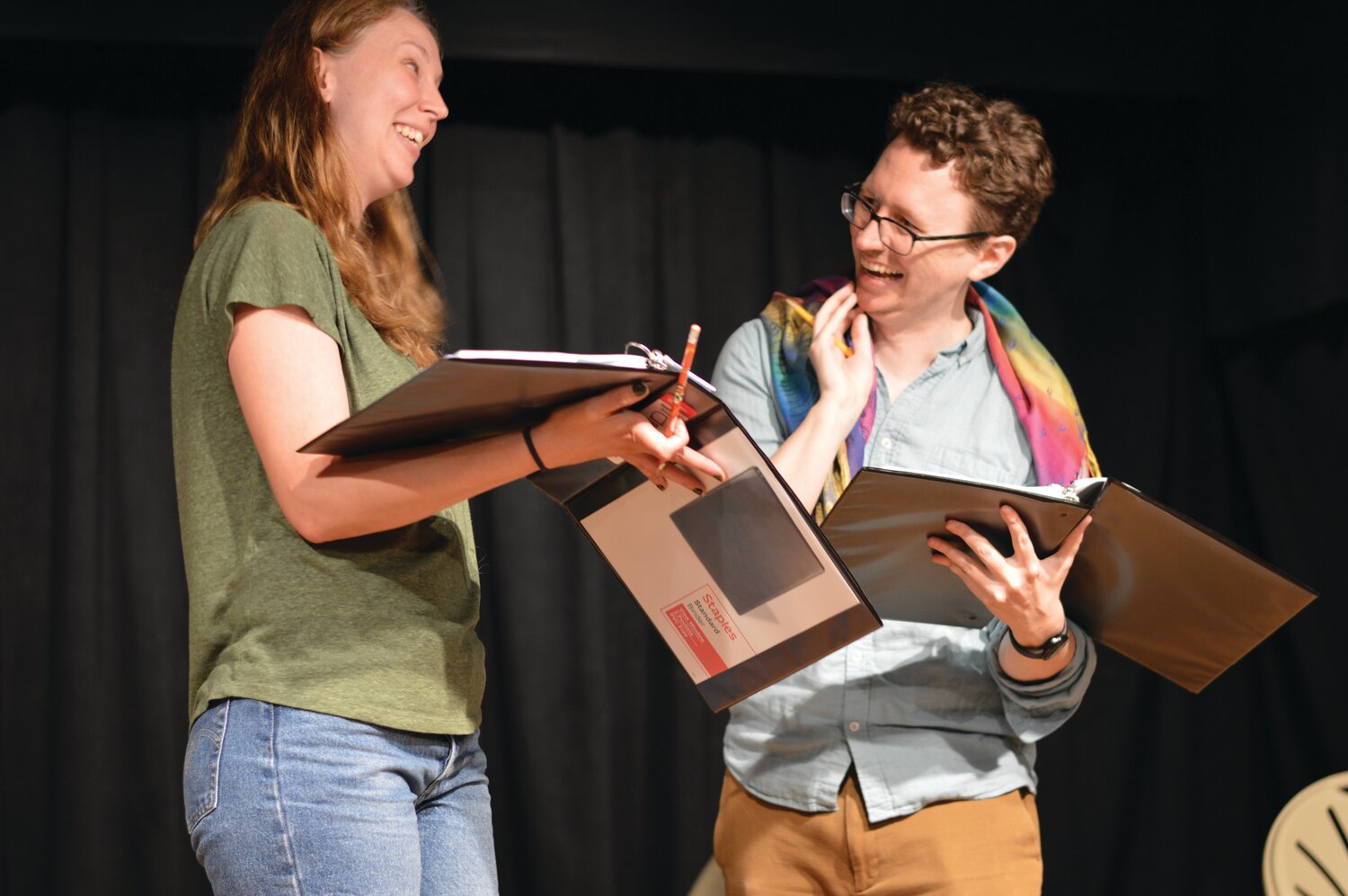 Holding scripts are Caitrin McLean, left, and Warren Smith, who portrays Bert Savoy in the play.