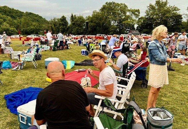 Before the skies opened and lightning put an early stop to Saturday’s Riverside Symphonia’s Concert Under the Stars, many guests were able to enjoy the picnic suppers.