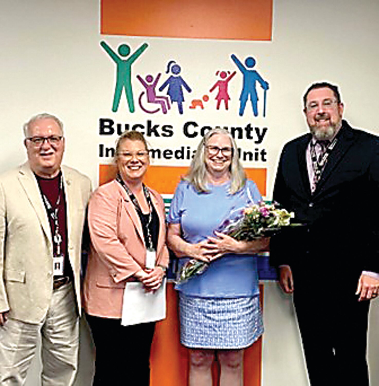 From left are: John D’Angelo, president of the Bucks IU Board of School Directors; Gina Meissler, Bucks IU program director, related services; Mary Crooks, Bucks IU occupational therapist; and Dr. Mark Hoffman, Bucks IU executive director.