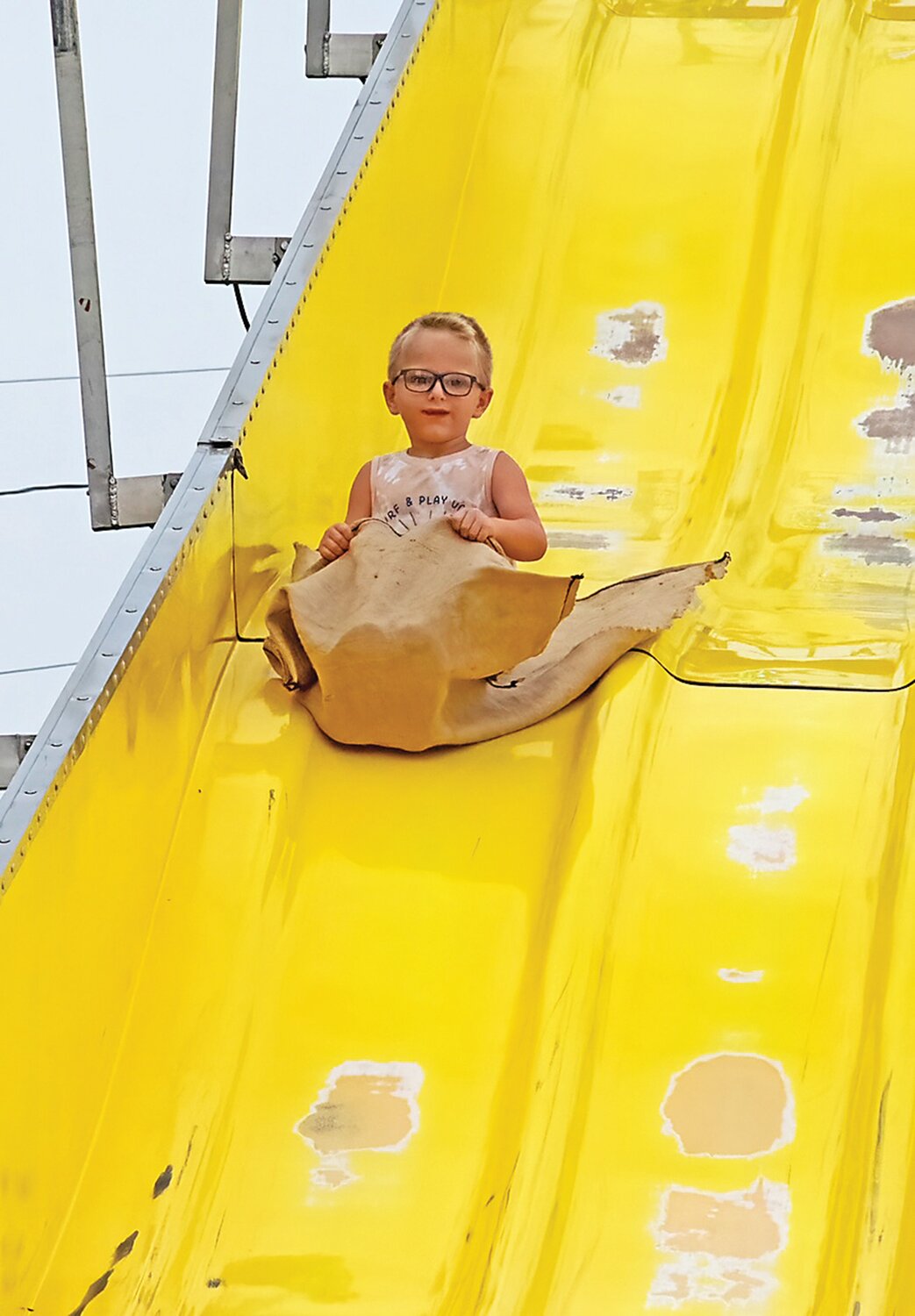 Christian Malseed of Lansdale rides down the slide.