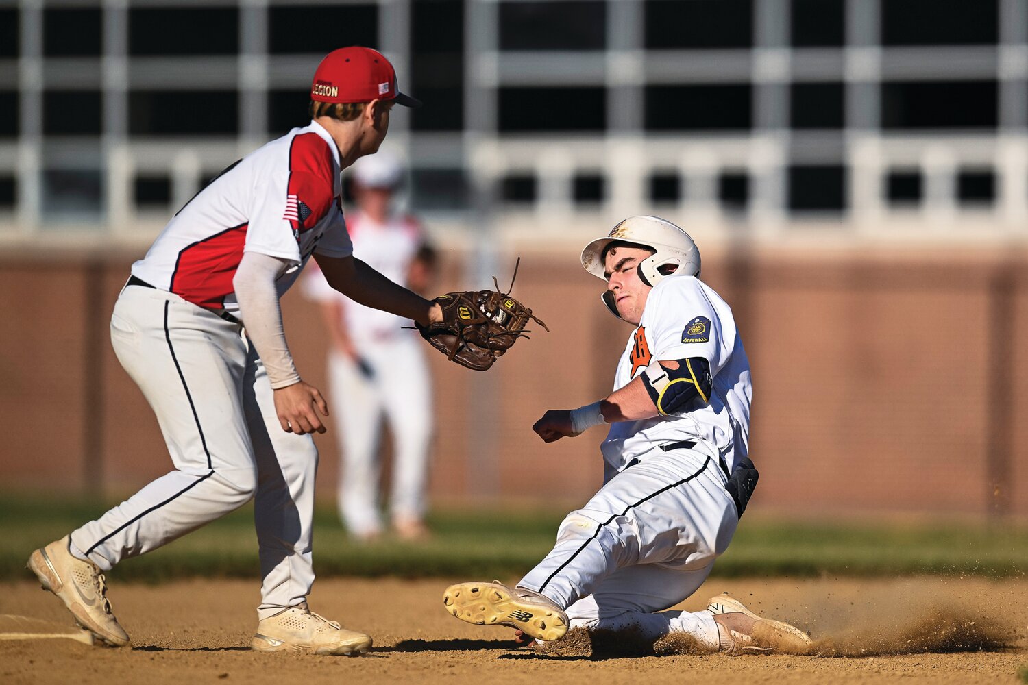 Souderton’s Ranger Kling tags out Doylestown’s Matthew Sharkey while trying to advance to second base on an infield hit.