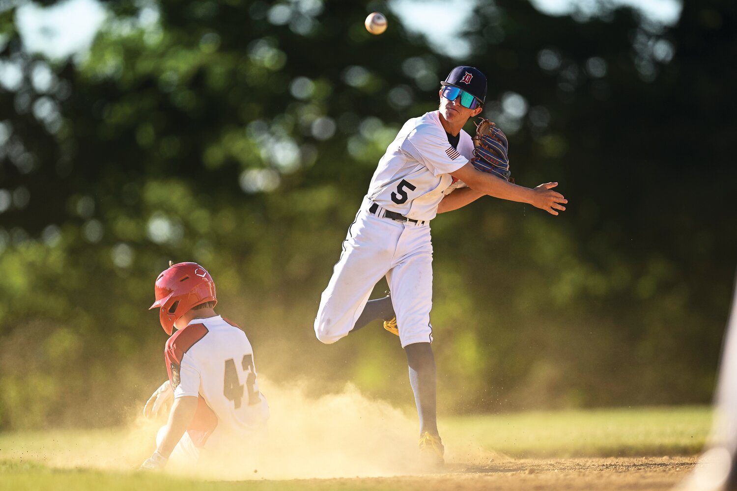 Doylestown’s Bobby Seaner tries to turn a double play in the third inning.