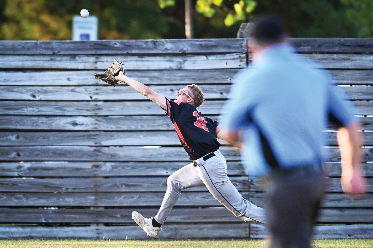 Quakertown Blazer and ECCBL Northern All-Star Mason Woolwine extends and makes a spectacular catch, running down a fly ball in foul territory in the fifth inning.