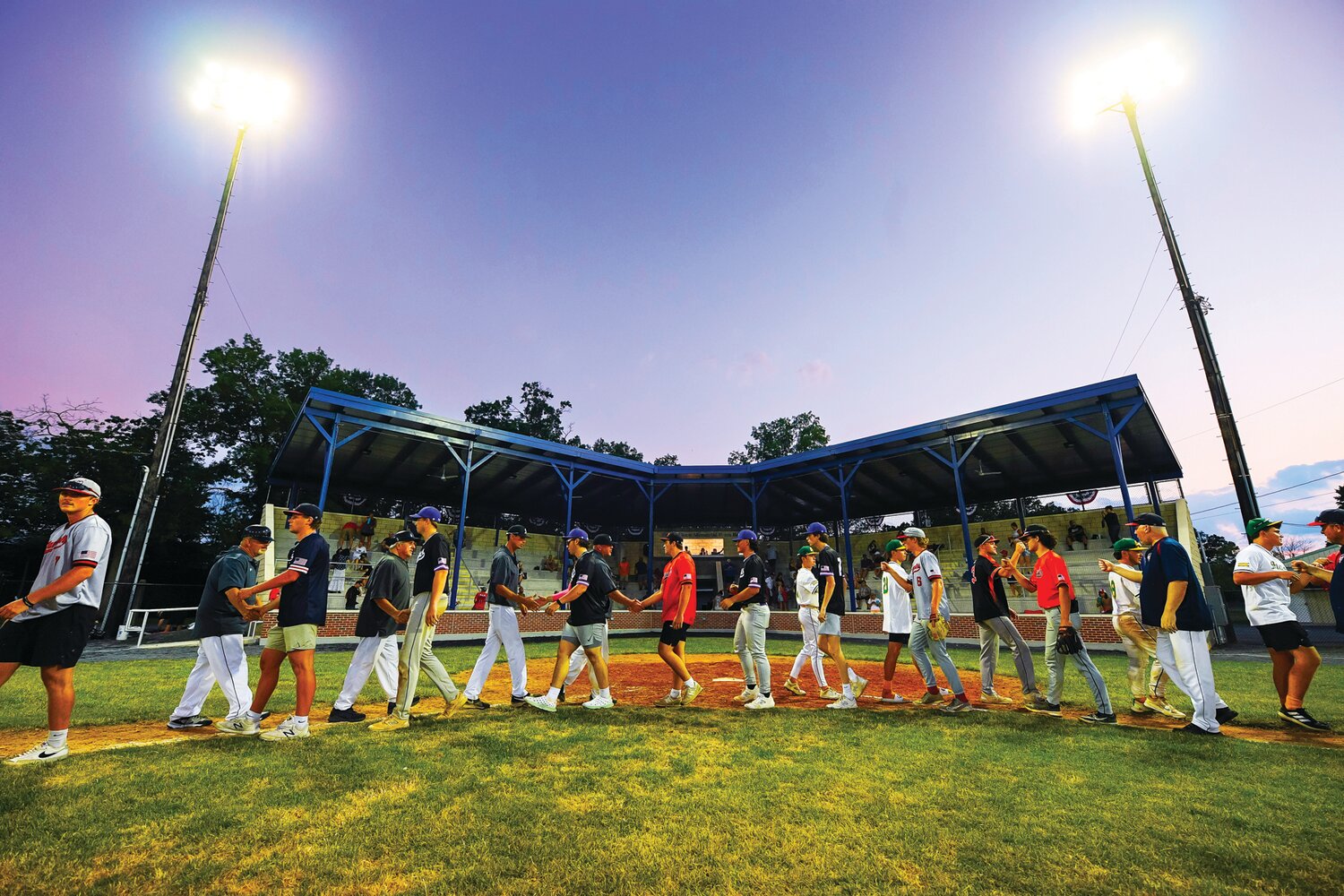 Players shake hands after the East Coast Collegiate Baseball League Southern All-Stars beat the Northern All-Stars 4-3.