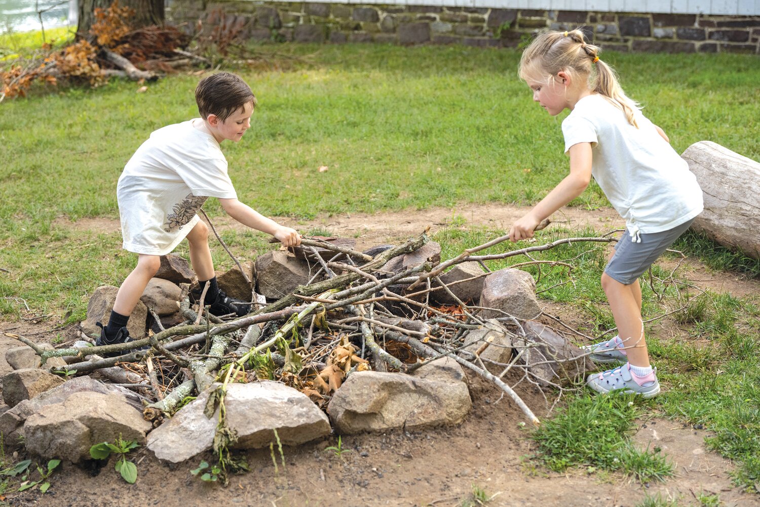 Marshall Parks and Iris Warren play at the “campfire.”