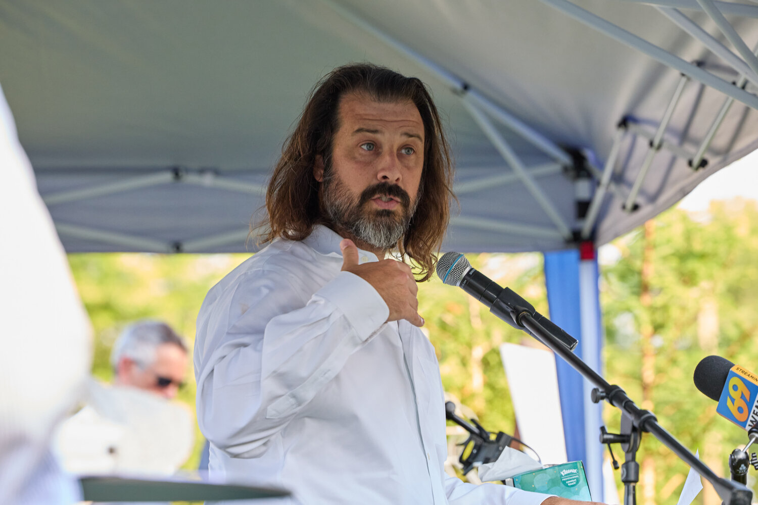 Zach DePiero speaks during Monday’s memorial service at The Crossing church.