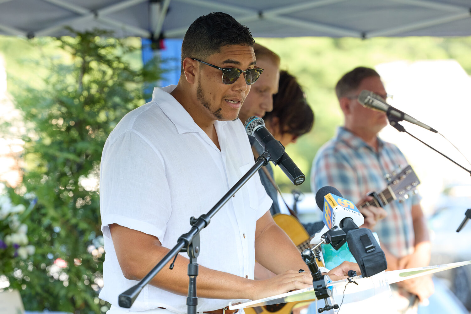 The Crossing lead pastor George Matthew Clash speaks during the memorial service for the seven victims of the flash flood that killed seven people last July.