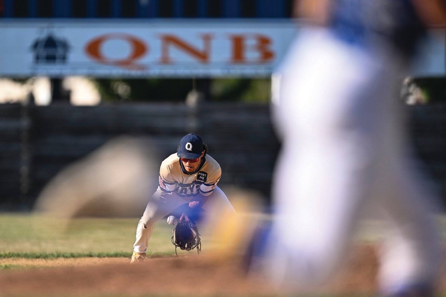 Quakertown’s Danny Qualteria fields a ground ball for an out during the third inning.