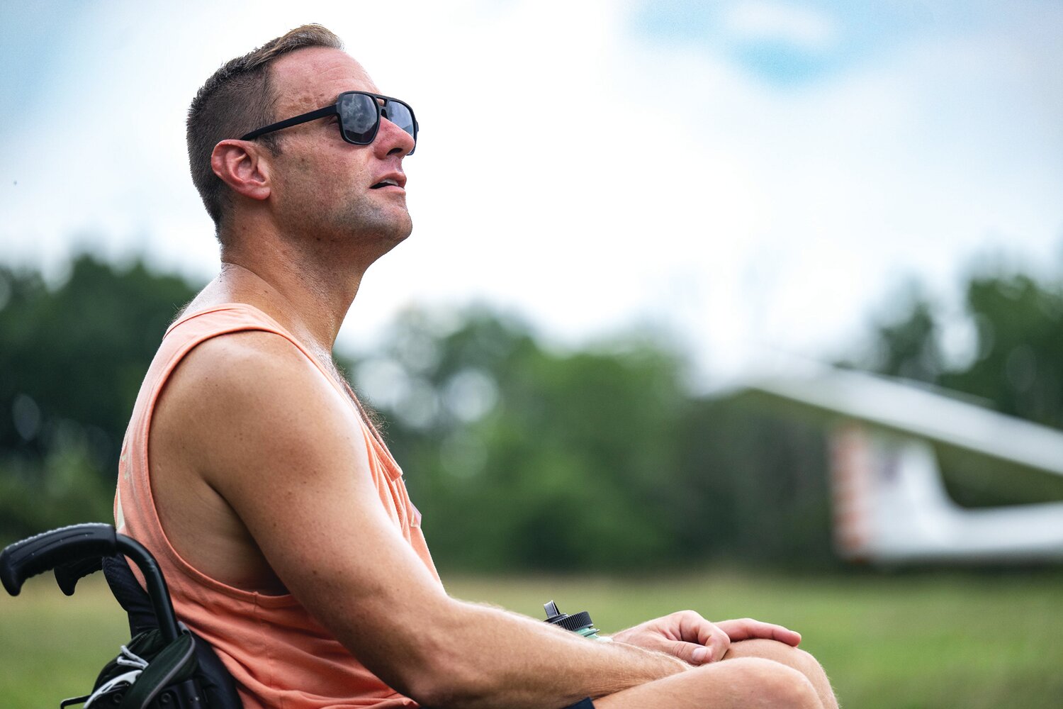 Michael McDonald watches the gliders soar in the sky after his flight experience. He is among members of Individuals in Motion, a volunteer-centered organization serving Northeastern Pennsylvania.