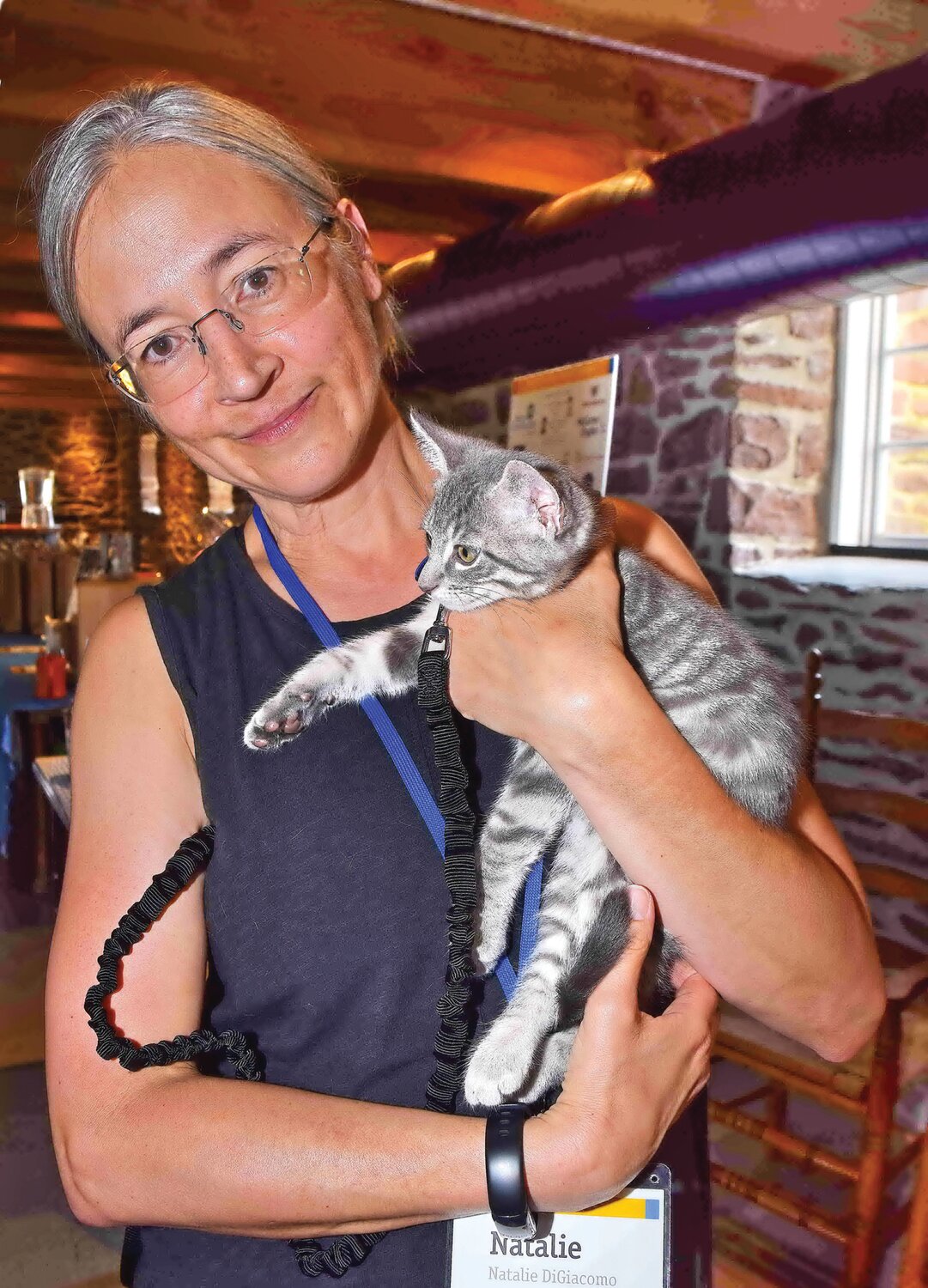 Natalie DiGiacomo with adoptable kitten Cal.