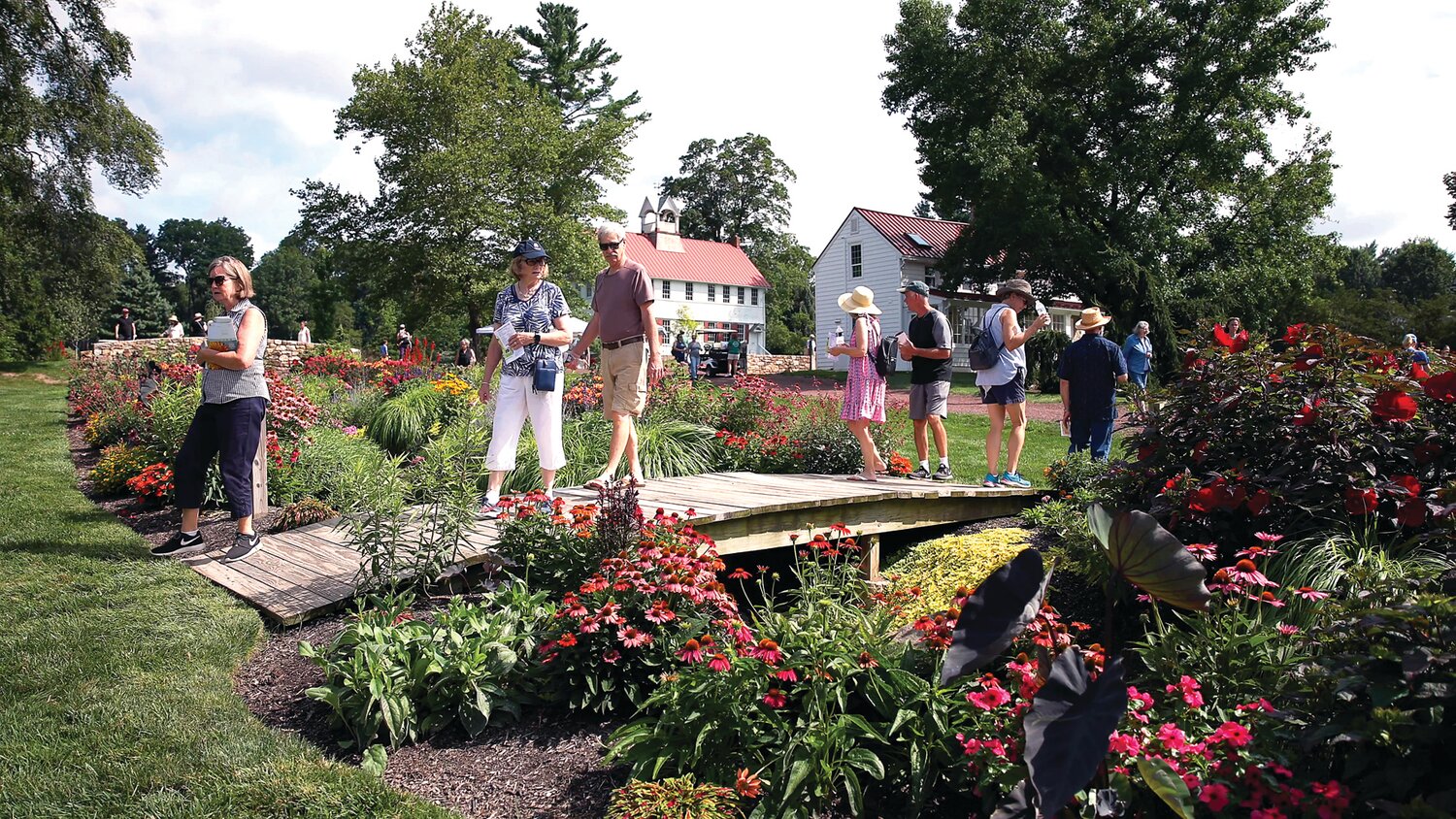 Visitors tour Fordhook Farm during a prior Burpee Opening.