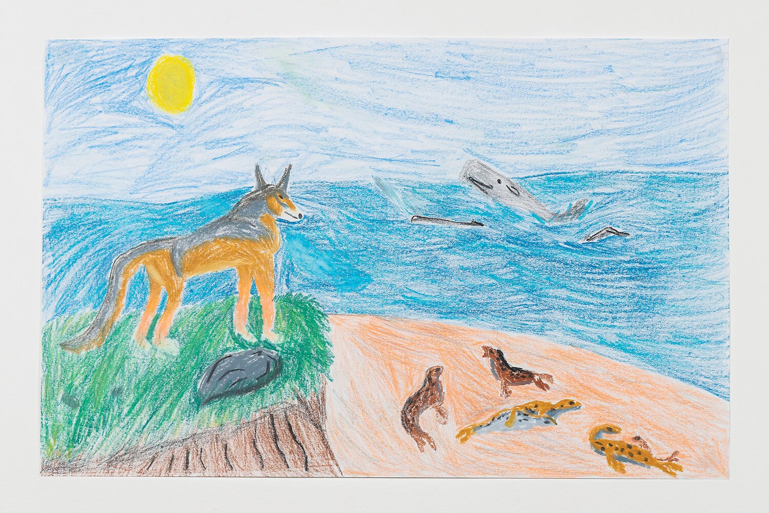 “Untitled,” caran d’ache on paper, 2024, a crayon drawing with animals atop a bluff overlooking a beach scene, is by Daniel Lacey.