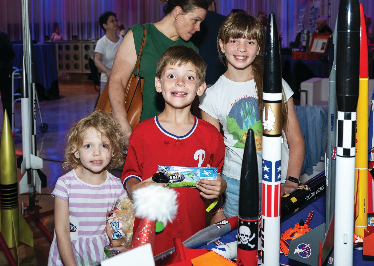 Katherine, Paul and Evelyn Kobilnyk enjoy the rocket display.