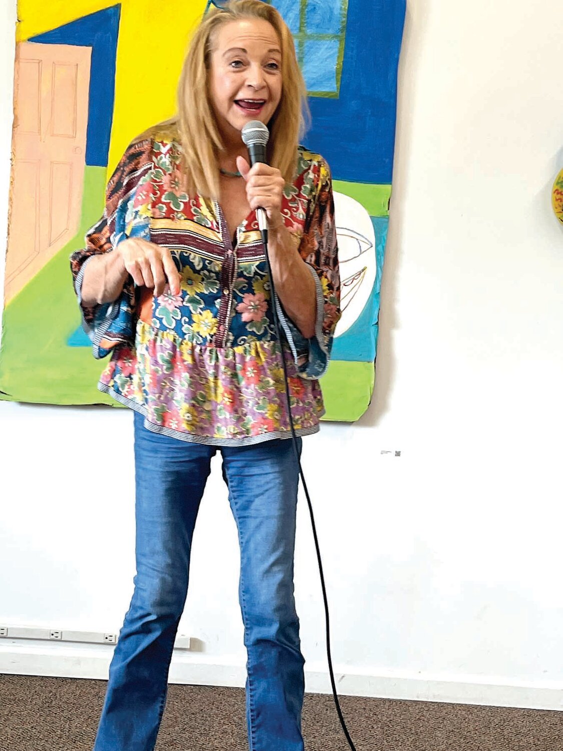 Marie Labbancz tries new material at the Women’s Comedy Open Mic in Flemington on Sunday, July 14.