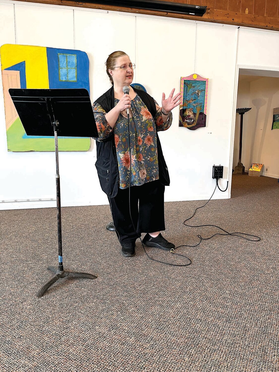 Carolynn Mincin, of Belleville, N.J., performs at the Women’s Open Mic in Flemington on Sunday, July 14.