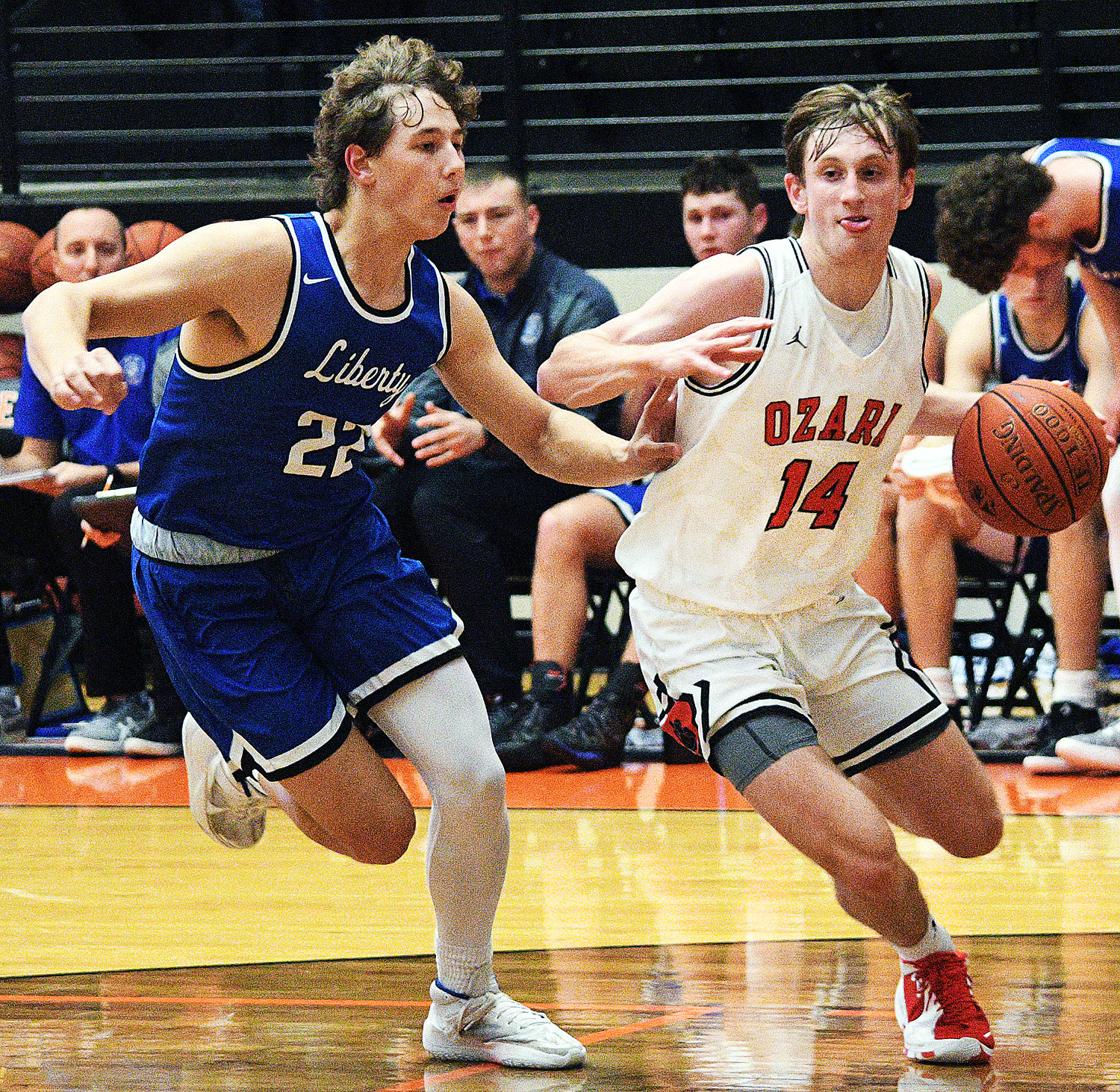 OZARK’S EtHAN WHATLEY looks for a lane to the bucket against Liberty on Saturday.