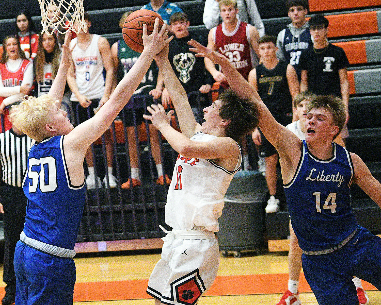 COLTON BALLARD is fouled by a Liberty defender.