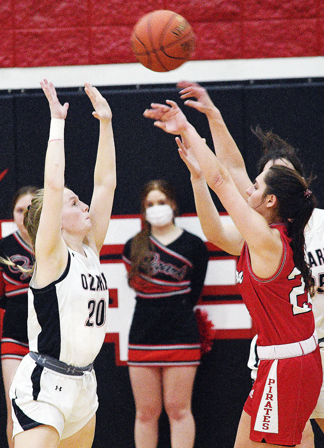 MOLLY RUSHING defends a pass to the paint.