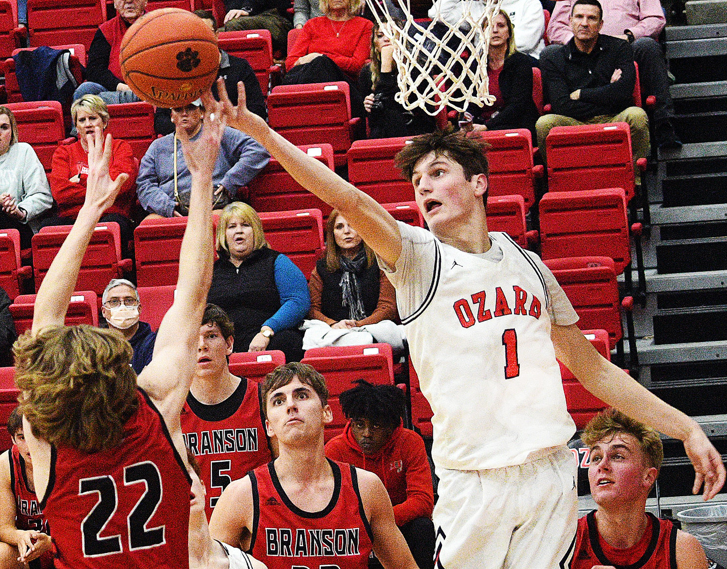OZARK’S JACE WHATLEY reaches for a rebound versus Branson on Tuesday.