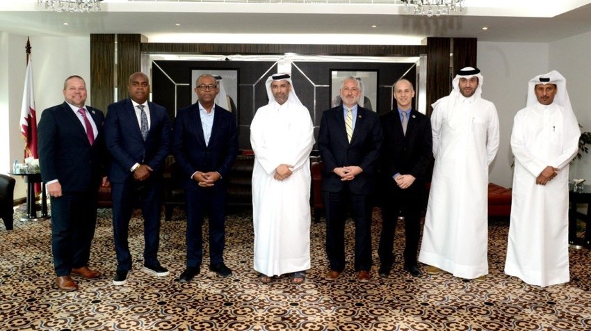 Lansing Mayor Andy Schor (third from right) poses for a picture with mayors and other top government officials in Qatar.