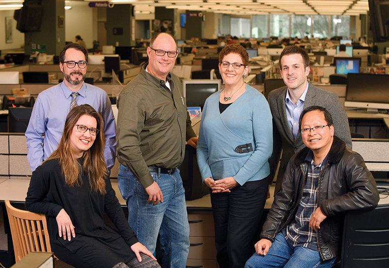 The Baltimore Sun team who worked on “The 45-Minute Mystery of Freddie Gray’s Death” include (from left) Catherine Rentz (seated), Adam Marton, Christopher T. Assaf, Amy Davis, Kevin Rector and Kenneth K. Lam. Not pictured Greg Kohn. (Photo by Lloyd Fox/Baltimore Sun)